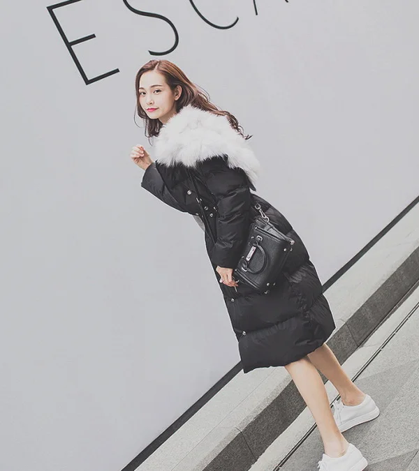 羽绒服穿这个颜色才不会显臃肿
