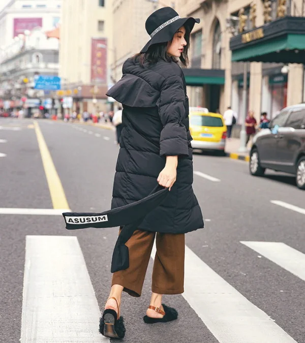 羽绒服穿这个颜色才不会显臃肿